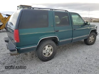 1996 GMC Yukon with VIN 1GKEK13R6TJ747606, listed as a Copart auction lot 80763434 with 308,837 mi miles and Salvage Title. Bid and sale history available at carsss.com. Image 3.