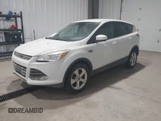 2014 Ford Escape SE with VIN 1FMCU9GX0EUC76506, listed as a IAAI auction lot 42131024 with 117,897 mi miles and . Bid and sale history available at carsss.com. Image 2.