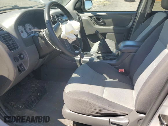2005 Ford Escape XLS Value with VIN 1FMYU92Z55KC93604, listed as a Copart auction lot 60104145 with 86,788 mi miles and Salvage title. Bid and sale history available at DreamBid. Image 7.