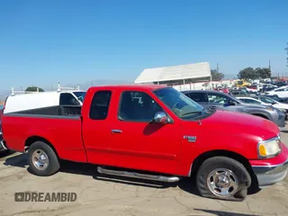 2002 Ford F-150 XL with VIN 1FTRX17W52NA81828, listed as a IAAI auction lot 41450811 with 201,948 mi miles. Bid and sale history available at carsss.com. Image 13.