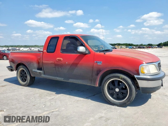 1997 Ford F-150 XL with VIN 1FTDX07W0VKB80857, listed as a Copart auction lot 58839715 with 148,547 mi miles and Salvage title. Bid and sale history available at DreamBid. Image 4.