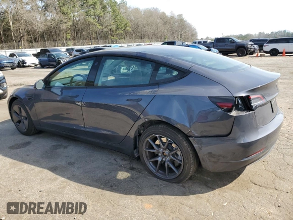 2023 Tesla Model 3 with VIN 5YJ3E1EA8PF699931, listed as a Copart auction lot 49293795 with 13,119 mi miles and Salvage Title. Bid and sale history available at DreamBid. Image 2.