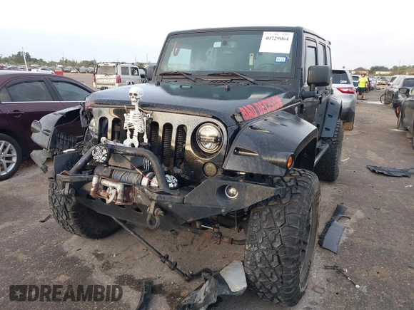 2013 Jeep Wrangler Unlimited Rubicon with VIN 1C4BJWFG2DL531203, listed as a IAAI auction lot 40729064 with 84,296 mi miles. Bid and sale history available at carsss.com. Image 2.