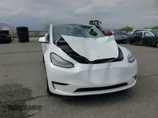2021 Tesla Model Y Long Range z VIN 5YJYGDEE9MF200411, wystawiony jako Copart lot #53738075 z przebiegiem 97 546 mil mil oraz Szkoda całkowita • Salvage title. Historia ofert i sprzedaży dostępna na DreamBid. Obrazek 14.