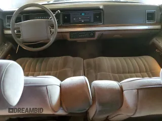 1990 Ford Crown Victoria z VIN 2FACP73F9LX166174, wystawiony jako Copart lot #76043234 z przebiegiem 52 545 mil mil oraz Szkoda całkowita • Salvage title. Historia ofert i sprzedaży dostępna na DreamBid. Obrazek 8.
