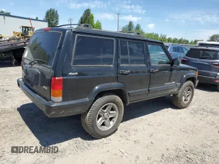 2000 Jeep Cherokee Classic with VIN 1J4FF58S4YL175741, listed as a Copart auction lot 60677205 with Not provided miles and Clean title. Bid and sale history available at DreamBid. Image 3.