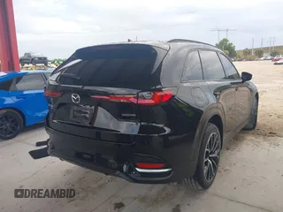 2025 Mazda CX-70 Premium Plus with VIN JM3KJEHA2S1111590, listed as a IAAI auction lot 41650609 with 5,377 mi miles and . Bid and sale history available at DreamBid. Image 4.