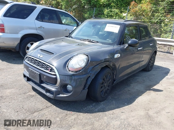2017 MINI Hardtop 4 Door Cooper S z VIN WMWXU3C52H2D32498, wystawiony jako IAAI lot #42000212 z przebiegiem 70 231 mil mil oraz . Historia ofert i sprzedaży dostępna na DreamBid. Obrazek 17.