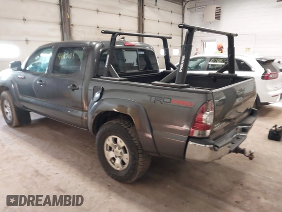 2014 Toyota Tacoma with VIN 3TMLU4EN3EM151917, listed as a IAAI auction lot 41769083 with 216,910 mi miles. Bid and sale history available at carsss.com. Image 3.