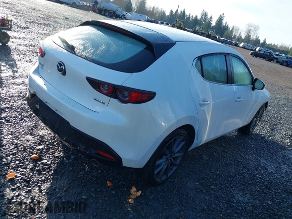 2019 Mazda Mazda3 Hatchback with VIN JM1BPBJM6K1124773, listed as a IAAI auction lot 41838263 with 50,702 mi miles. Bid and sale history available at carsss.com. Image 4.