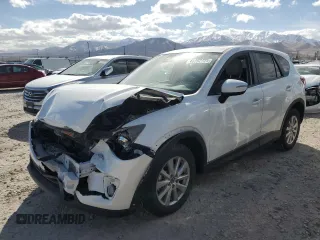 2015 Mazda CX-5 Touring with VIN JM3KE4CY7F0553862, listed as a Copart auction lot 48392725 with 122,530 mi miles and Salvage Title. Bid and sale history available at carsss.com. Image 1.