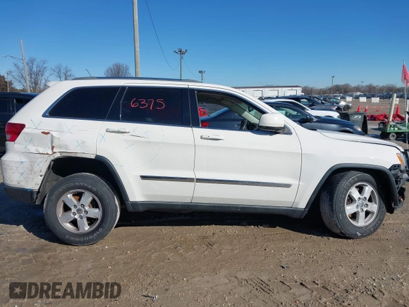 2012 Jeep Grand Cherokee Laredo with VIN 1C4RJFAGXCC224138, listed as a IAAI auction lot 41736375 with 133,383 mi miles. Bid and sale history available at carsss.com. Image 14.