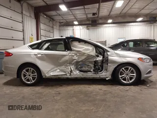 2018 Ford Fusion SE with VIN 3FA6P0HD1JR243112, listed as a IAAI auction lot 42256676 with 112,003 mi miles and . Bid and sale history available at DreamBid. Image 14.