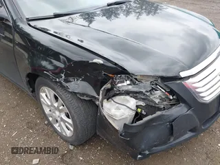2008 Toyota Avalon XL z VIN 4T1BK36B98U322973, wystawiony jako IAAI lot #42293619 z przebiegiem 115 168 mil mil oraz . Historia ofert i sprzedaży dostępna na DreamBid. Obrazek 6.