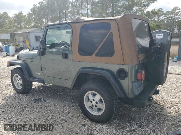 2000 Jeep Wrangler SE with VIN 1J4FA29P6YP753791, listed as a Copart auction lot 43945135 with 162,532 mi miles and Salvage Title. Bid and sale history available at carsss.com. Image 2.