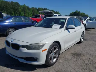 2014 BMW 3 Series 328i with VIN WBA3A5C58EF605108, listed as a IAAI auction lot 42129770 with 169,924 mi miles and . Bid and sale history available at DreamBid. Image 2.