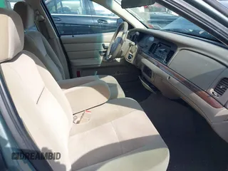 2005 Ford Crown Victoria Standard с VIN 2FAFP73W25X121741, выставлен на аукционе IAAI как лот 42059966 с пробегом 99 667 миль миль и . История ставок и продаж доступна на DreamBid. Изображение 5.