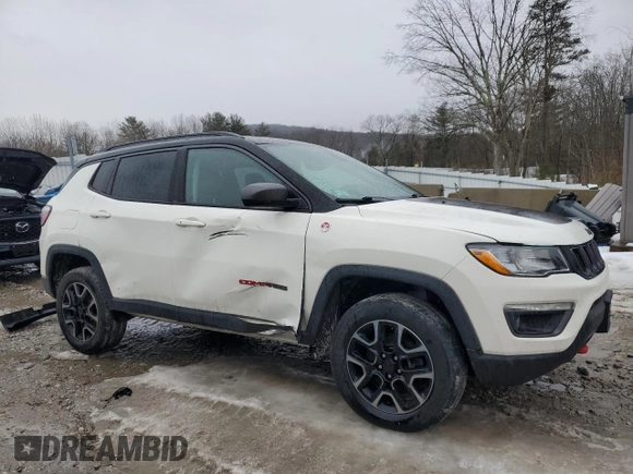 2019 Jeep Compass Trailhawk with VIN 3C4NJDDB0KT671292, listed as a Copart auction lot 46418675 with 175,494 mi miles and Salvage Title. Bid and sale history available at DreamBid. Image 4.
