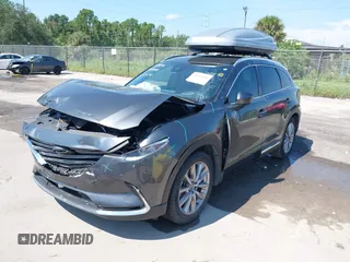 2022 Mazda CX-9 Grand Touring with VIN JM3TCBDY4N0618680, listed as a IAAI auction lot 40086806 with 34,142 mi miles and . Bid and sale history available at DreamBid. Image 17.