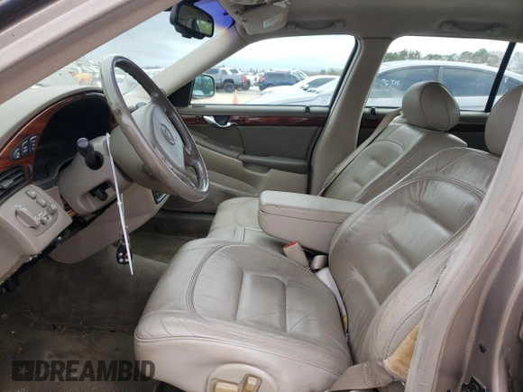 2003 Cadillac DeVille with VIN 1G6KD54Y03U206526, listed as a Copart auction lot 38023213 with 103,724 mi miles and Salvage Title. Bid and sale history available at carsss.com. Image 7.