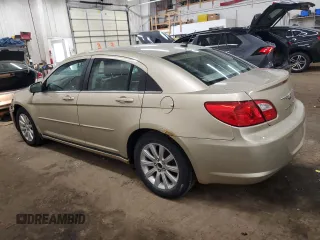 2010 Chrysler Sebring Limited with VIN 1C3CC5FD1AN190847, listed as a Copart auction lot 51219675 with 144,025 mi miles and Salvage title. Bid and sale history available at DreamBid. Image 2.