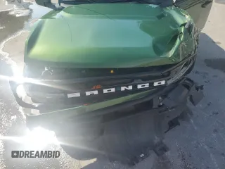 2022 Ford Bronco z VIN 1FMDE5BHXNLA88611, wystawiony jako Copart lot #58135415 z przebiegiem 15 448 mil mil oraz Nie do naprawy • Non repairable. Historia ofert i sprzedaży dostępna na DreamBid. Obrazek 12.