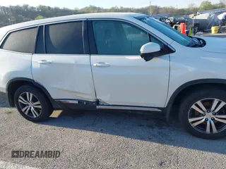 2017 Honda Pilot EX-L with VIN 5FNYF6H54HB015814, listed as a IAAI auction lot 41955743 with 122,389 mi miles and . Bid and sale history available at DreamBid. Image 13.