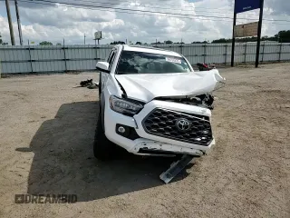 2022 Toyota Tacoma SR с VIN 3TMCZ5AN0NM468020, выставлен на аукционе Copart как лот 58708235 с пробегом 112 523 миль миль и На запчасти • Non repairable. История ставок и продаж доступна на DreamBid. Изображение 14.