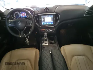 2015 Maserati Ghibli z VIN ZAM57XSA2F1146396, wystawiony jako Copart lot #56568585 z przebiegiem 85 556 mil mil oraz Szkoda całkowita • Salvage title. Historia ofert i sprzedaży dostępna na DreamBid. Obrazek 8.