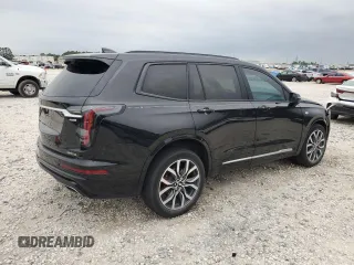 2023 Cadillac XT6 AWD Sport z VIN 1GYKPGRS6PZ126039, wystawiony jako Copart lot #55948605 z przebiegiem 39 966 mil mil oraz Szkoda całkowita • Salvage title. Historia ofert i sprzedaży dostępna na DreamBid. Obrazek 3.