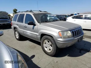 2001 Jeep Grand Cherokee Limited with VIN 1J4GW58S61C565685, listed as a Copart auction lot 73168374 with 252,978 mi miles and Clean Title. Bid and sale history available at carsss.com. Image 4.