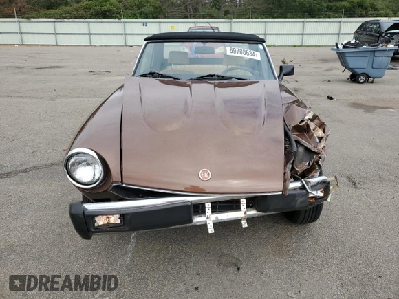 1980 FIAT 124 Spider z VIN 124CS20160764, wystawiony jako Copart lot #69708634 z przebiegiem 64 421 mil mil oraz Szkoda całkowita • Salvage title. Historia ofert i sprzedaży dostępna na DreamBid. Obrazek 5.