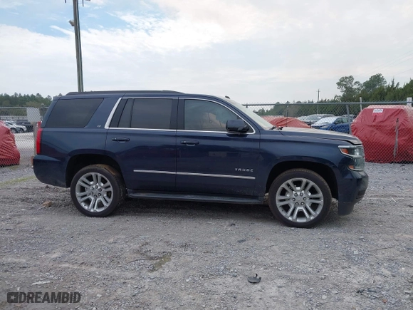 2019 Chevrolet Tahoe LT with VIN 1GNSCBKC7KR133119, listed as a IAAI auction lot 41570650 with 114,575 mi miles. Bid and sale history available at carsss.com. Image 13.