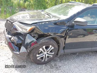 2017 Toyota RAV4 LE with VIN 2T3BFREV5HW651308, listed as a IAAI auction lot 42701783 with 112,829 mi miles and . Bid and sale history available at DreamBid. Image 6.