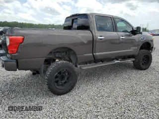 2017 Nissan Titan SL z VIN 1N6BA1F27HN547900, wystawiony jako Copart lot #61768145 z przebiegiem 148 383 mil mil oraz Szkoda całkowita • Salvage title. Historia ofert i sprzedaży dostępna na DreamBid. Obrazek 3.