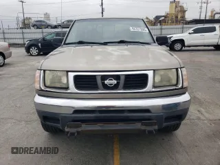 2000 Nissan Frontier XE with VIN 1N6ED27T8YC357939, listed as a Copart auction lot 55727395 with 143,842 mi miles and Salvage title. Bid and sale history available at DreamBid. Image 5.