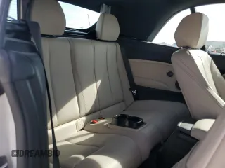 2016 BMW 2 Series M235i with VIN WBA1M1C52GV394052, listed as a Copart auction lot 82261594 with 83,979 mi miles and Salvage Title. Bid and sale history available at carsss.com. Image 10.