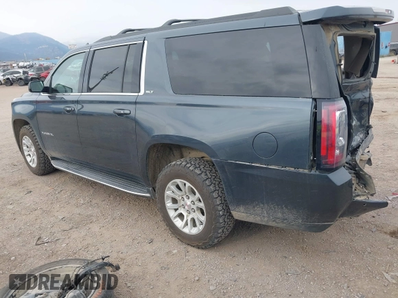 2019 GMC Yukon XL SLT with VIN 1GKS2GKC0KR345860, listed as a IAAI auction lot 40727072 with 127,568 mi miles and . Bid and sale history available at carsss.com. Image 3.