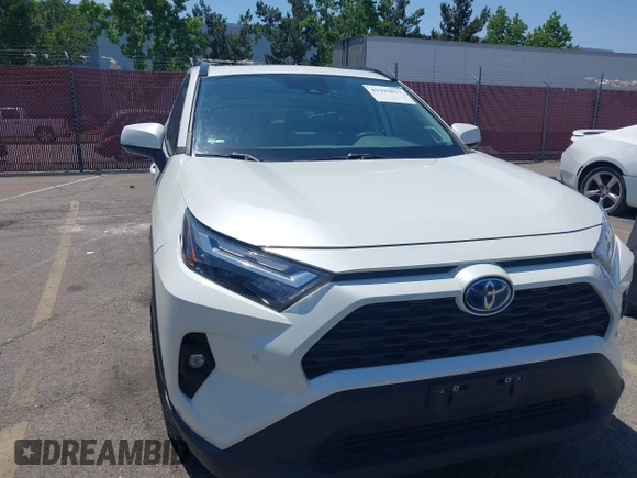 2022 Toyota RAV4 Hybrid XLE Premium z VIN 4T3B6RFVXNU079761, wystawiony jako IAAI lot #42395817 z przebiegiem 73 830 mil mil oraz . Historia ofert i sprzedaży dostępna na DreamBid. Obrazek 6.
