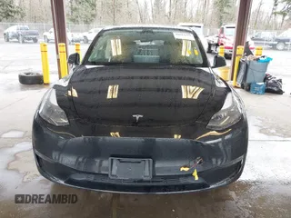 2023 Tesla Model Y Long Range with VIN 7SAYGAEE7PF739924, listed as a IAAI auction lot 41612323 with 75,226 mi miles and . Bid and sale history available at DreamBid. Image 11.