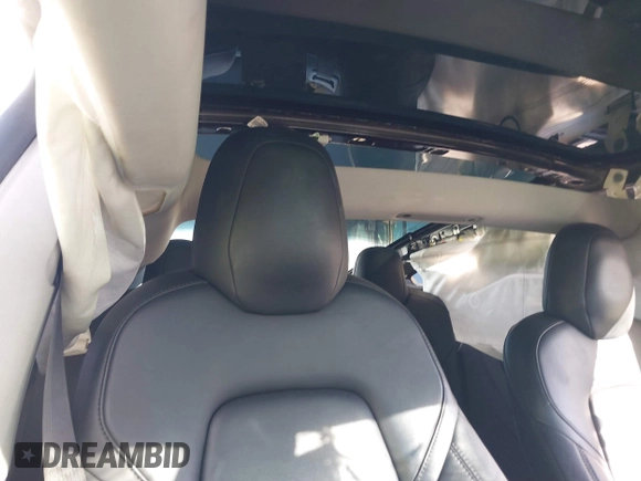 2019 Tesla Model 3 Mid Range with VIN 5YJ3E1EA0KF399082, listed as a IAAI auction lot 41697100 with 138,998 mi miles and . Bid and sale history available at carsss.com. Image 8.