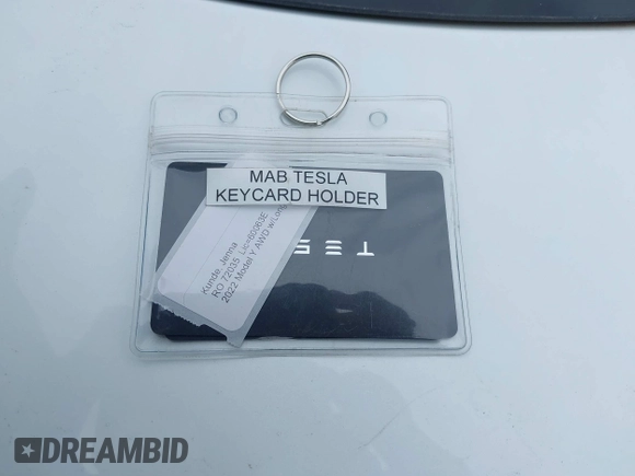 2022 Tesla Model Y Long Range with VIN 7SAYGDEE1NF421098, listed as a IAAI auction lot 42177555 with 55,855 mi miles and . Bid and sale history available at carsss.com. Image 11.