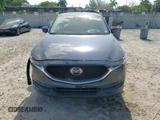 2021 Mazda CX-5 Grand Touring with VIN JM3KFBDM4M1462570, listed as a Copart auction lot 54827675 with 45,389 mi miles and Salvage Title. Bid and sale history available at DreamBid. Image 14.