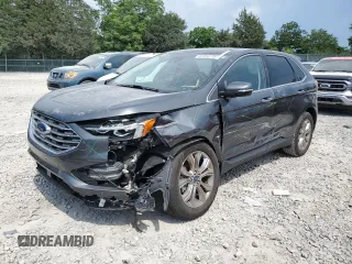 2020 Ford Edge Titanium z VIN 2FMPK3K9XLBB60780, wystawiony jako Copart lot #62354735 z przebiegiem 60 328 mil mil oraz Szkoda całkowita • Salvage title. Historia ofert i sprzedaży dostępna na DreamBid. Obrazek 1.
