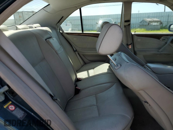 2000 Mercedes-Benz E-Class with VIN WDBJF65J1YB151080, listed as a Copart auction lot 54421955 with 392,612 mi miles and Salvage Title. Bid and sale history available at carsss.com. Image 11.