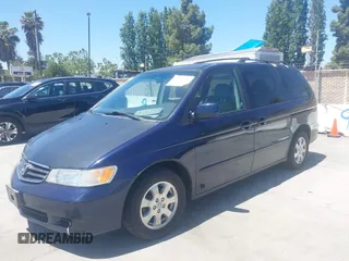 2003 Honda Odyssey EX-L z VIN 5FNRL189X3B151554, wystawiony jako IAAI lot #42297496 z przebiegiem 172 719 mil mil oraz . Historia ofert i sprzedaży dostępna na DreamBid. Obrazek 6.