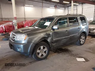 2011 Honda Pilot EX-L with VIN 5FNYF4H65BB020721, listed as a IAAI auction lot 41794436 with 113,630 mi miles and . Bid and sale history available at carsss.com. Image 2.