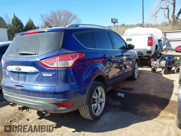 2016 Ford Escape Titanium with VIN 1FMCU0J95GUC41632, listed as a IAAI auction lot 41692040 with 144,834 mi miles. Bid and sale history available at carsss.com. Image 4.
