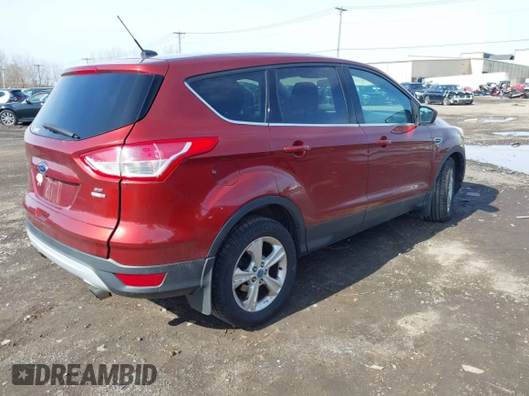 2014 Ford Escape SE with VIN 1FMCU9GX3EUA81161, listed as a IAAI auction lot 41968609 with 112,931 mi miles and . Bid and sale history available at DreamBid. Image 4.