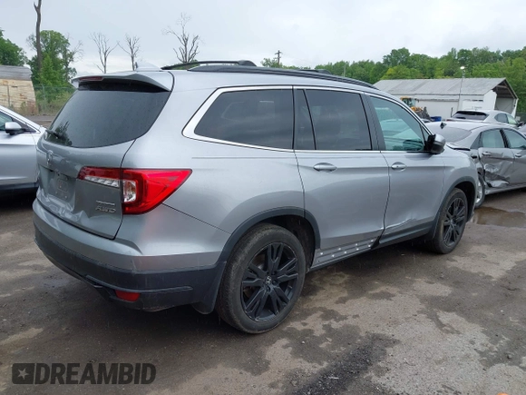 2021 Honda Pilot Special Edition with VIN 5FNYF6H28MB066328, listed as a IAAI auction lot 42231908 with 44,099 mi miles and . Bid and sale history available at DreamBid. Image 4.